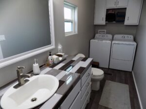 Look at this bathroom and laundry room