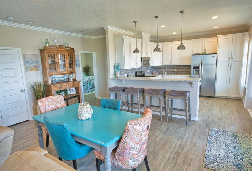 Nice buffet and storage closet separate the bedrooms , with Master Suite on the right