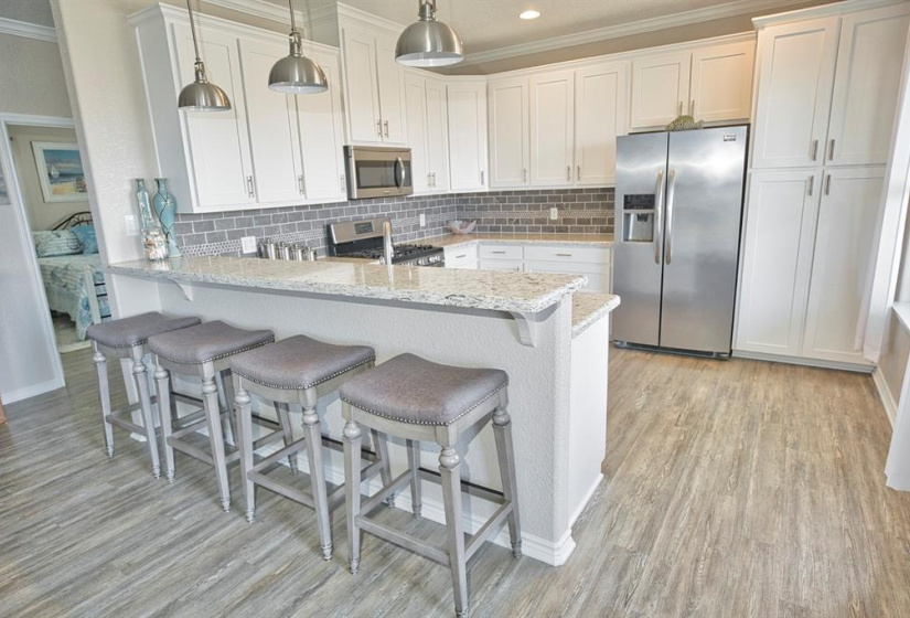 I LOVE the Quartz Counter tops, very unique with just a slight sparkle!