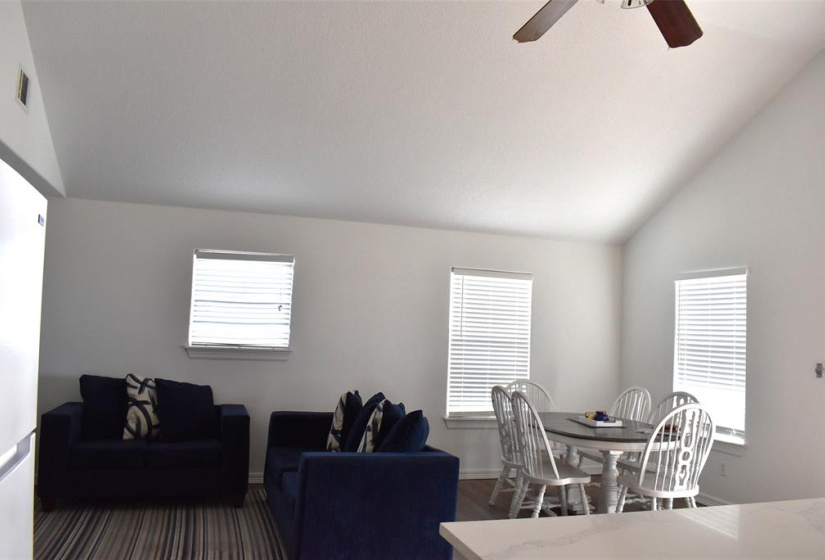 Cathedral ceiling, window treatments stay!  All furnishings stay