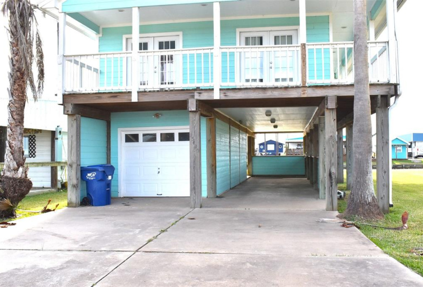 You have a 1/2 garage for storage as well
