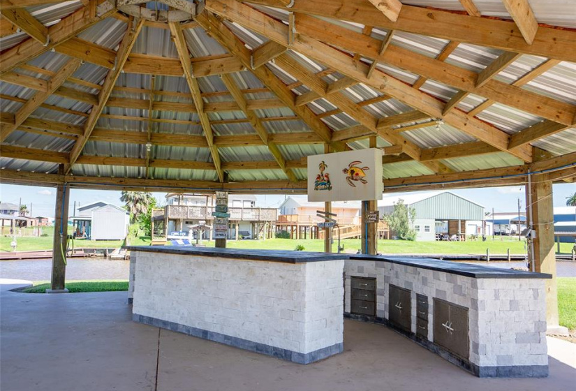 Spacious cabana with ample cabinets and expansive counters, perfect for entertaining.