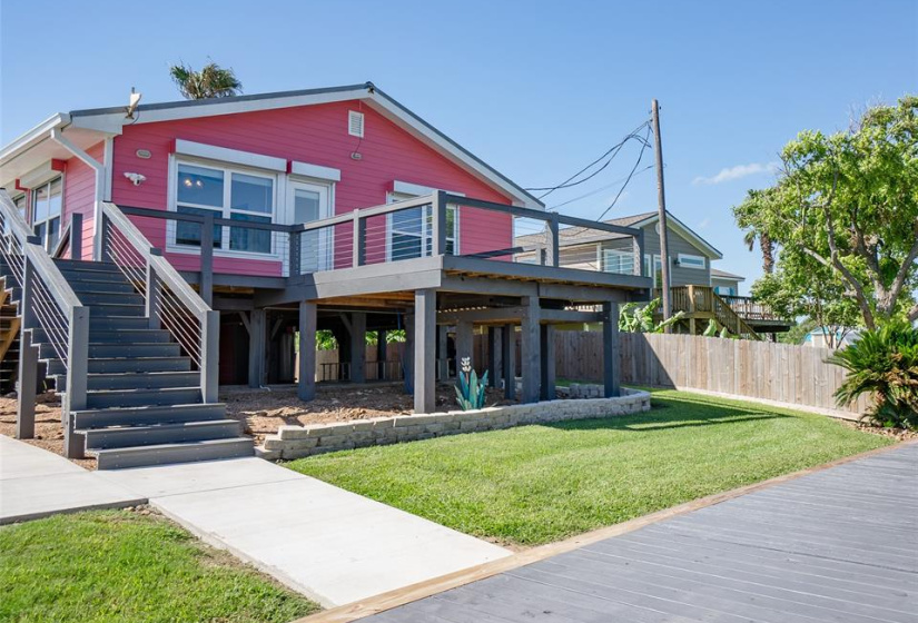 Stunning waterfront view from the back of the home, showcasing a spacious deck 
