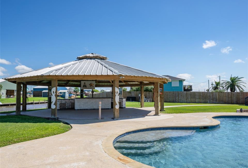 Enjoy seamless outdoor entertaining with a sparkling pool and stylish cabana.