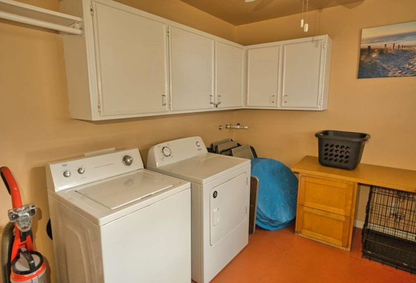 Huge Utility Room with storage, hanging space and folding area!!