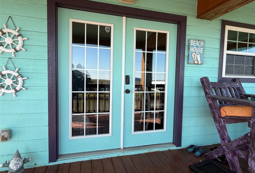 Inviting entrance from a rustic wooden deck.
