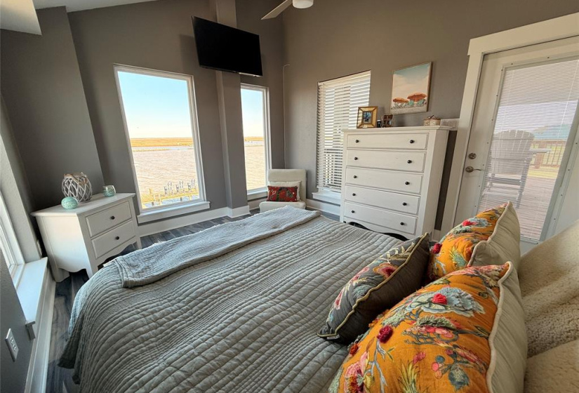 Posh bedroom with incredible views of the ICW and Wildlife Refuge.
