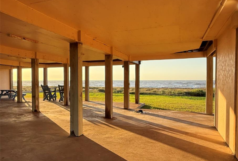 Expansive open areas under the house with direct views of the ocean.  Ideal for enjoying seaside living in the shade.