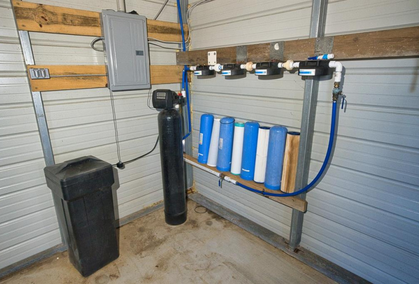 Storage area and water filtration for the 40' Cedar Creek RV
