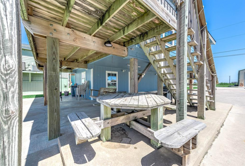 Built in picnic table under home.