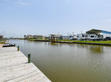 Welcome to Sargent, Texas.  Great place to fish, crab, boat from your own private pier/dock.  Plus enjoy the outdoors.  This canal front property has a vinyl Bulkhead and the 50' x 8' dock/pier that was replaced in 2018.