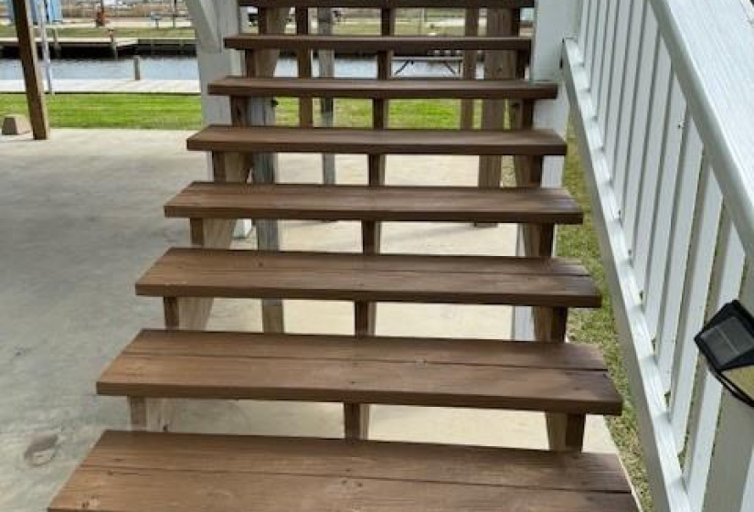 Stairs up to the home.  Stairs were replaced in 2018 and re-stained in 2024.