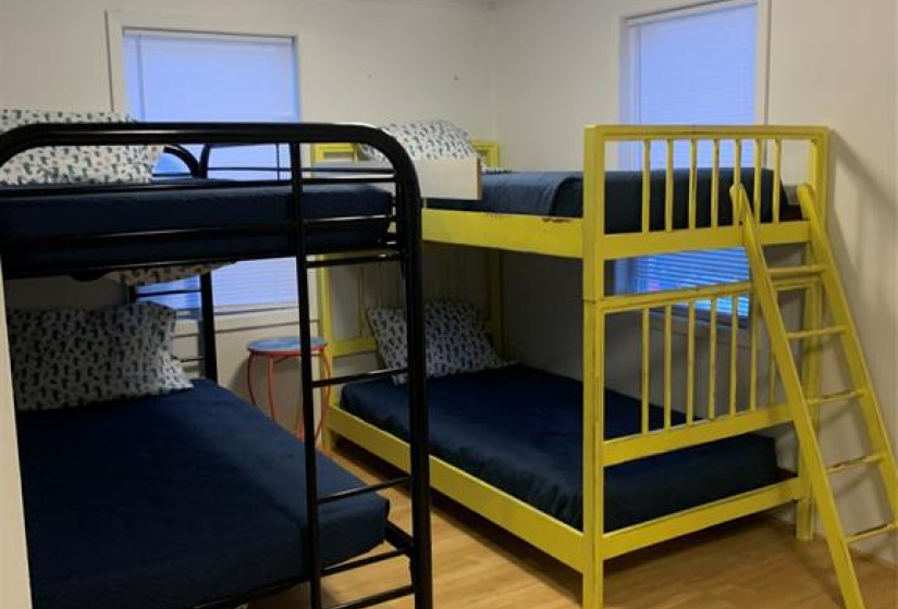 Third bedroom has large windows.