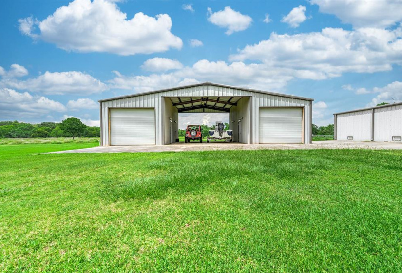 Shop across the street on large dry lot.