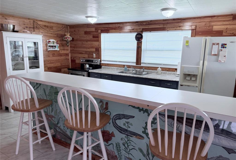 Breakfast bar with sea life mural.