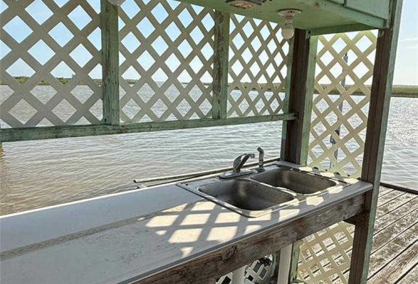 Fish clean station with fresh water sink.