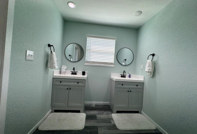 Primary bedroom with two walk in closets.