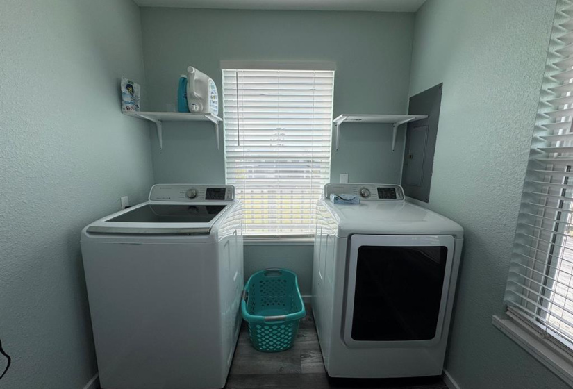 Laundry room on the main floor just off the kitchen.