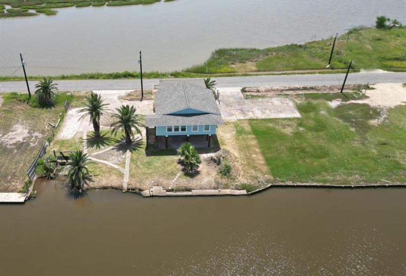 Water views on both sides of this property with fishing and crabbing possible from your own backyard!