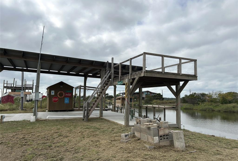 You get 2 lots, storage shed, entertainment decks, commercial grade concrete pad to park your RV, and your own Private fishing pier!