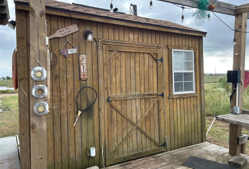 Great storage shed for all of your fishing gear and even room for a Frig.