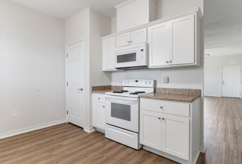 Another view of your new kitchen. Open to family room and dining area for entertaining ease. Note the large pantry.
