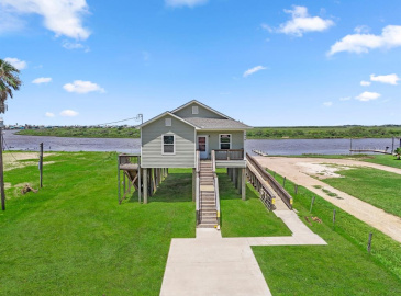 Welcome home to your waterfront retreat! Gorgeous home built in 2021. Soaring ceilings, LVP flooring, tile and neutral paint.Covered front and back porches to relax and enjoy coastal living.Easy commute to Houston. Minutes to the ICW and world class fishing. This one has it all!
