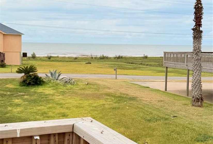 This photo shows a covered boat dock with wooden piers extending over the water, offering easy access for water activities. It's perfect for waterfront living.