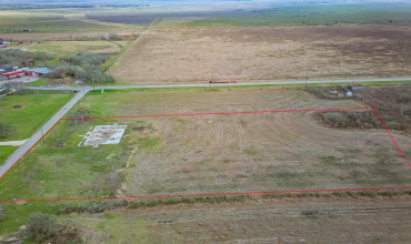 UNRESTRICTED ~4 acres of cleared land in the HEART OF SARGENT - just off FM 457 as you come into town - iIMAGINE the POSSIBILITIES with this property!   boundary lines are approximate and will need to be verified by the buyer