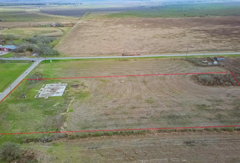 UNRESTRICTED ~4 acres of cleared land in the HEART OF SARGENT - just off FM 457 as you come into town - iIMAGINE the POSSIBILITIES with this property!   boundary lines are approximate and will need to be verified by the buyer