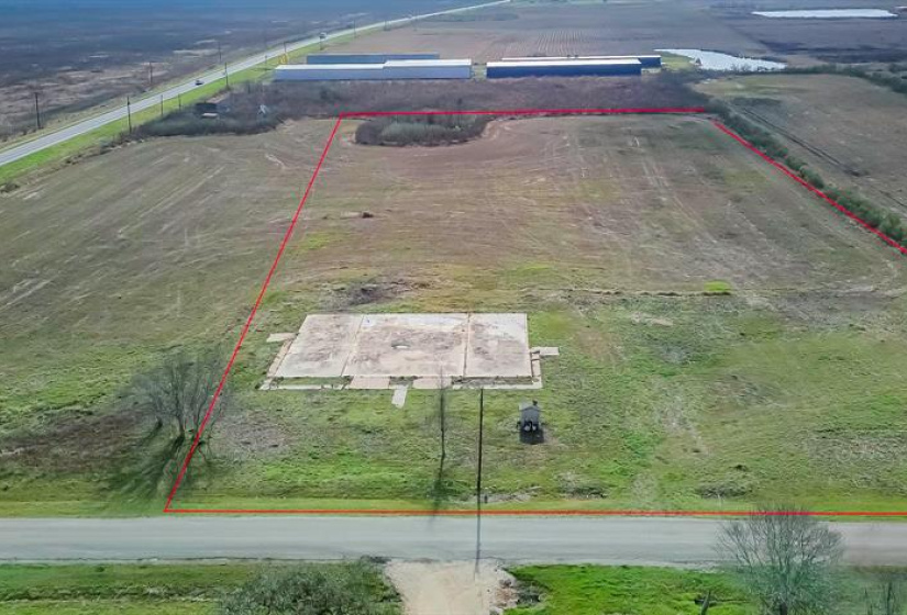 Nice concrete pad on ~4 acres of cleared UNRESTRICTED land-  boundary lines are approximate