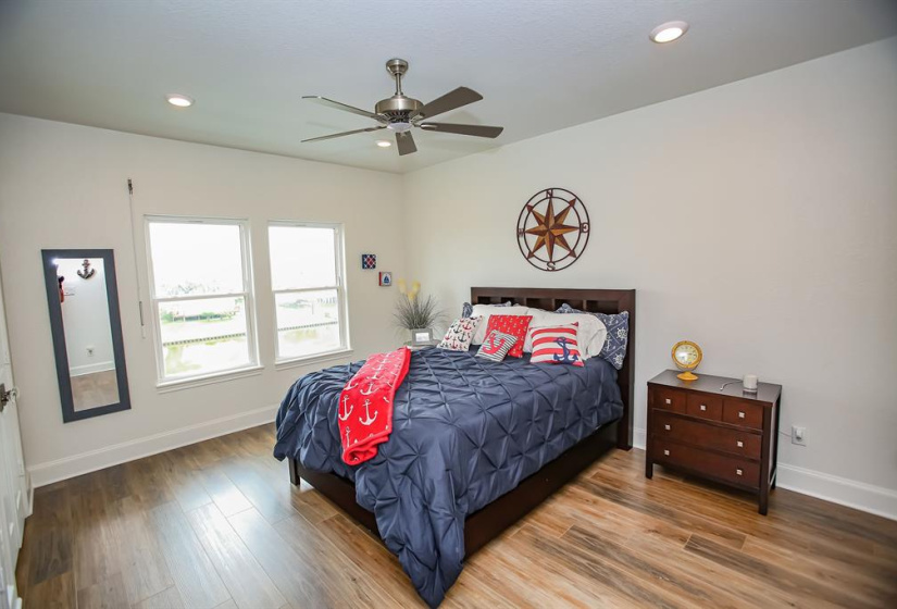 Upstairs bedroom connects with shared bath