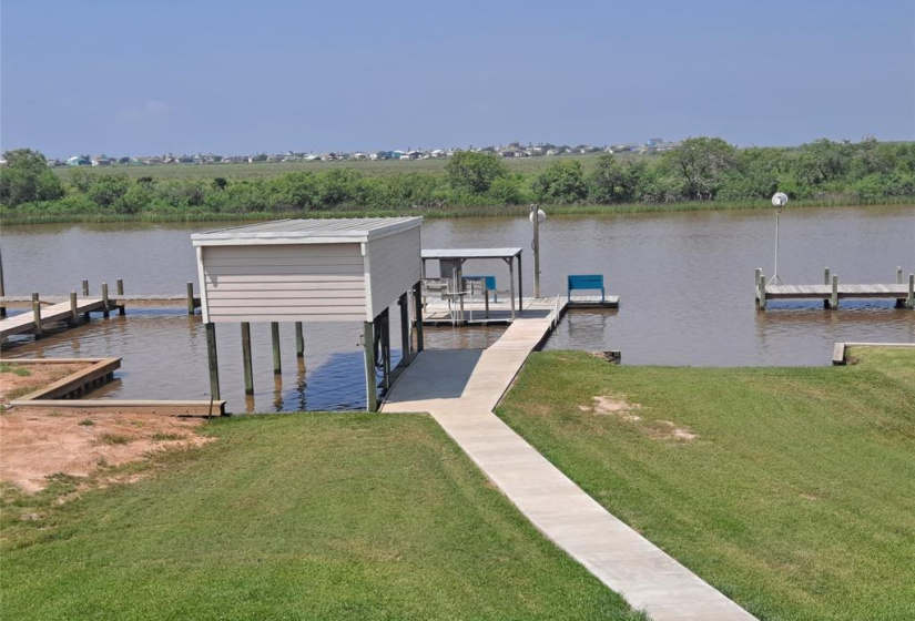 Covered boat lift and pier on Caney Creek