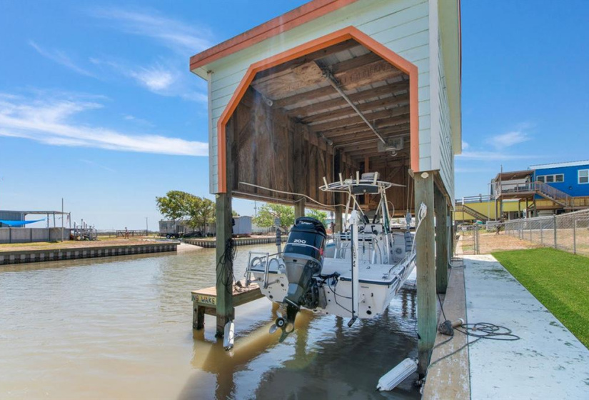 This one is built to last, any boat would love to call this home, with a walk around pier