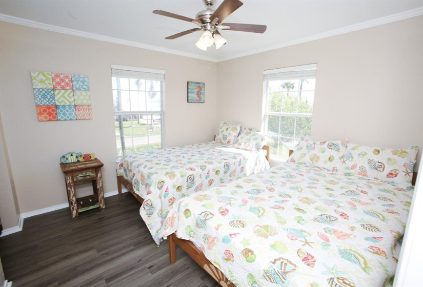 Large bedroom accommodates 2 Queen beds with room to spare!
