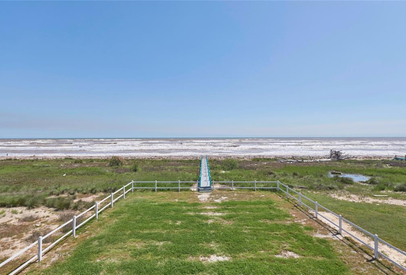 Right off the backyard is a private walkway to the beach!
