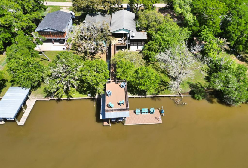 Areal View Of Property With Pier and Boathouse